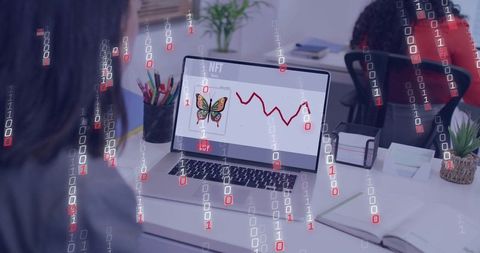 Woman viewing NFT market decline on laptop in coworking office with binary data overlay