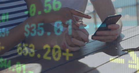 Couple Using Smartphone with Currency Display Overlay