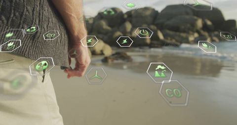 Man Exploring Shoreline with Virtual Eco Data Visualization