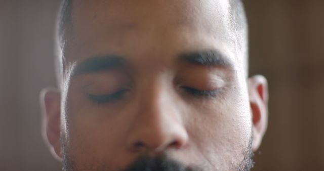 Close-Up of a Calm Man Meditating with Eyes Closed - Download Free Stock Images Pikwizard.com