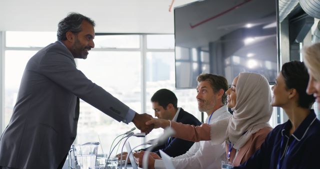 Successful Business Meeting with Professional Team Shaking Hands - Download Free Stock Images Pikwizard.com