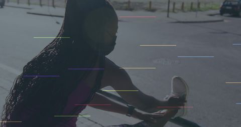 Fit African American Woman Stretching with Social Media Icons Overlay