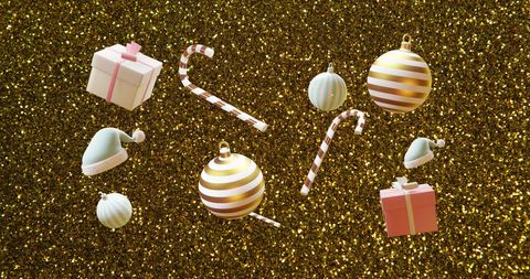 Festive Christmas Candy Canes and Baubles on Sparkling Gold Background