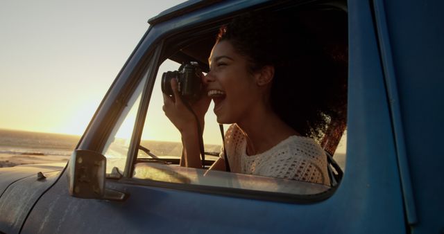 Young Woman Enjoying Photography Outdoors from Vintage Truck - Download Free Stock Images Pikwizard.com