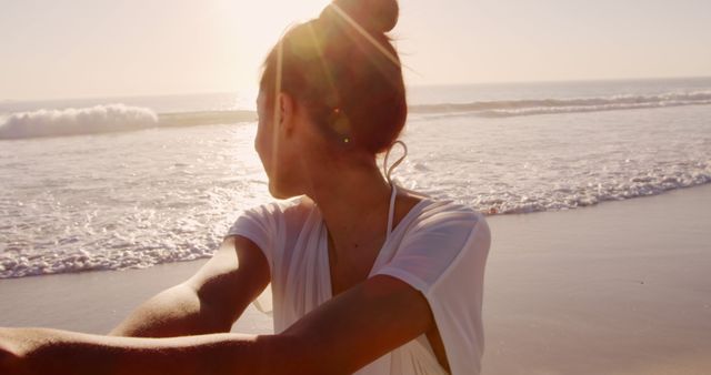 Young Woman Admiring Sunset on Beach - Download Free Stock Images Pikwizard.com