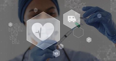 Female nurse drawing vaccine into syringe wearing mask and gloves with medical hex icons