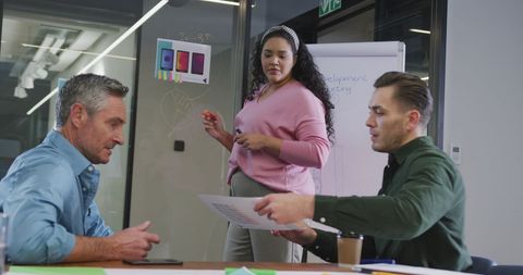 Diverse Team Engaged in Creative Office Meeting