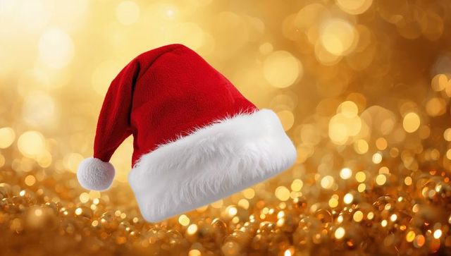 Floating Red Santa Hat Over Golden Bokeh Glitter Background
