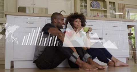 Couple relaxing in kitchen with coffee and digital analytics overlay for home planning