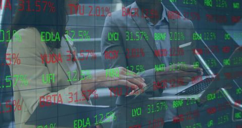 Financial Analyst Team Reviewing Stock Market Data