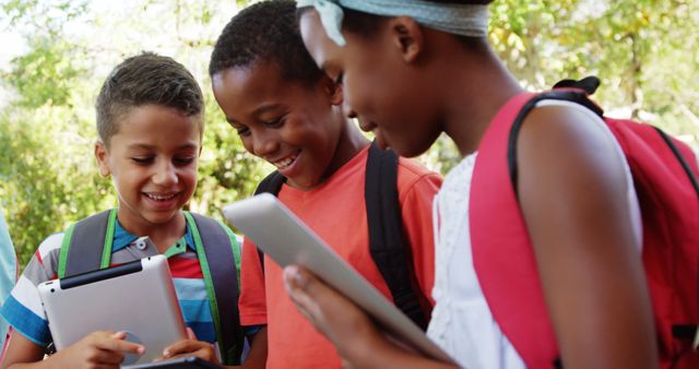 Diverse Children Engaged in Learning with Digital Tablets Outdoors - Download Free Stock Images Pikwizard.com