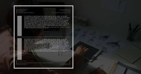 Fashion Designer Using Stylus on Tablet in Creative Workspace