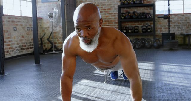 Determined Senior Man Doing Push-Ups in Gym - Download Free Stock Images Pikwizard.com