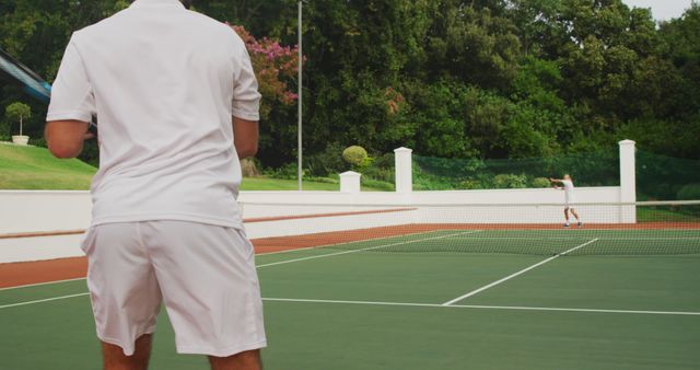 Men Playing Tennis Outdoors on Scenic Court - Download Free Stock Images Pikwizard.com