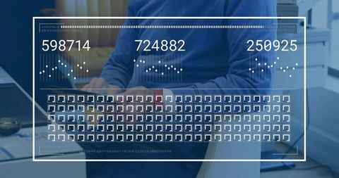 Mature man typing laptop using virtual hud analytics dashboard in modern office