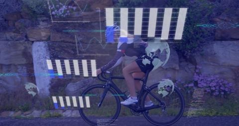 Professional Female Cyclist Analyzing Performance with Technology