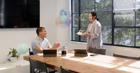 Business Team Celebrating Birthday in Office Environment