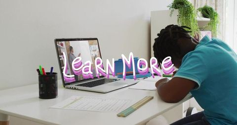 Boy studying at home desk with laptop and online tutor on whiteboard learn more graphic