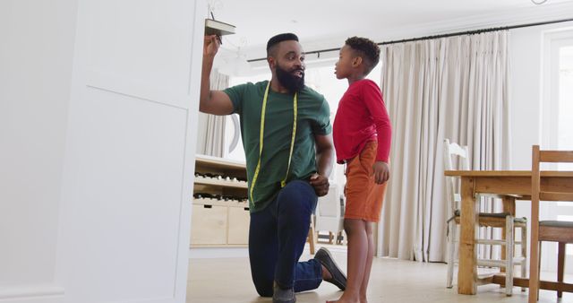 Father and Son Creating Intimate Moment in Modern Living Room - Download Free Stock Images Pikwizard.com