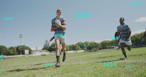 Rugby player sprinting with ball across sunny pitch with turquoise data overlays