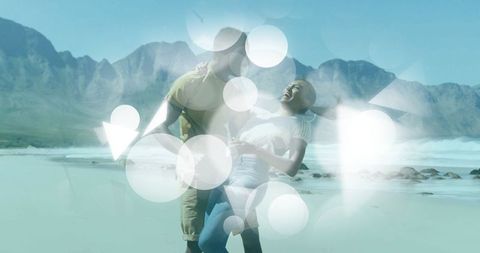 Couple Enjoying Playful Moment on Vibrant Beach