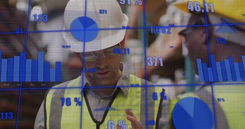 Warehouse Worker Analyzing Real-Time Data on Handheld Device