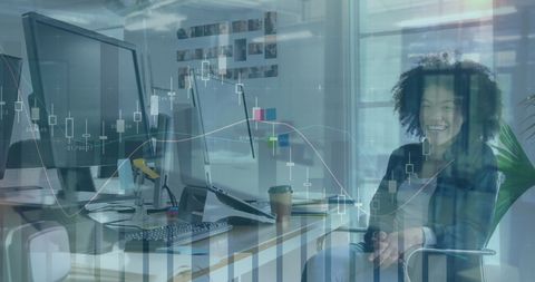 Woman Analyzing Financial Graphs in Modern Office Environment - Download Free Stock Images Pikwizard.com
