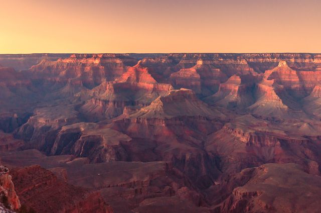 Stunning Sunset Over Grand Canyon with Rich Red and Orange Hues - Download Free Stock Photos Pikwizard.com