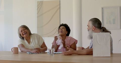 Joyful Family Celebrating with Thoughtful Gifts at Home