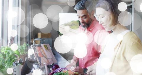 Couple Cooking Together at Bright Modern Kitchen