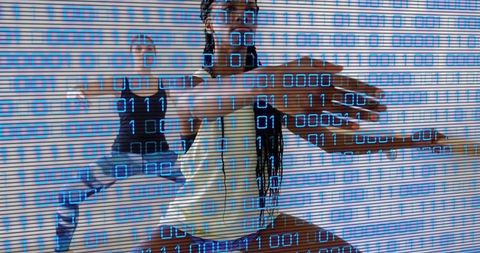 Dancer practicing expressive lunge with blue binary code projection in rehearsal studio