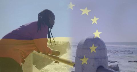 Thoughtful moments overlooking ocean on coastal promenade