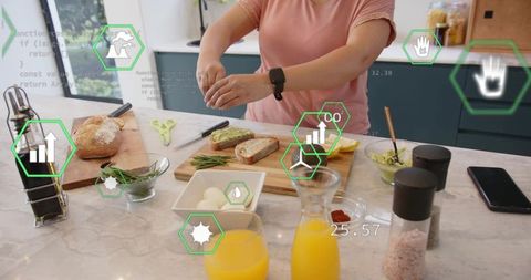 Sprinkling seasoning on avocado toast in augmented reality smart kitchen with breakfast data