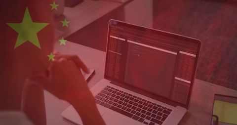 Woman lighting workspace in dim office, crossing fingers hopefully