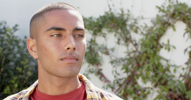 Pensive Young Man Outdoors in Casual Clothing - Download Free Stock Images Pikwizard.com