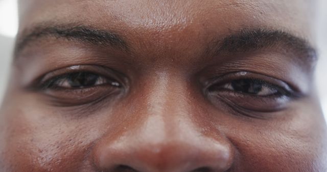 Close-Up of Positive African American Male Eyes and Forehead - Download Free Stock Images Pikwizard.com