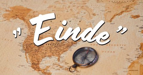 Compass on Map with 'Einde' Symbolizing Journey's Conclusion - Download Free Stock Images Pikwizard.com