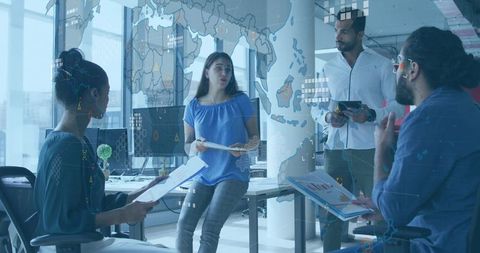 Female-led team presenting augmented reality data overlay in modern office meeting