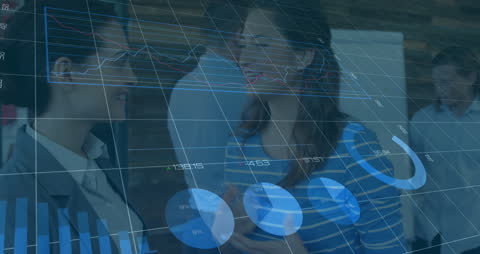 Businesswomen Discussing with Overlaid Analytics Graphics