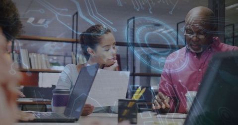 Diverse Team Collaborating with High-Tech Interface Overlay