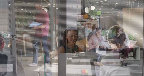 Busy Team Collaborating in Modern Office Environment