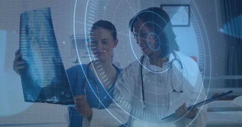 Medical Professionals Analyzing X-ray with Futuristic Technology Overlay