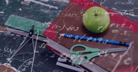 School supplies with mathematical equations overlay