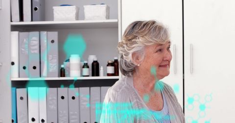 Senior Woman in Medical Office with Digital Graphics Overlay