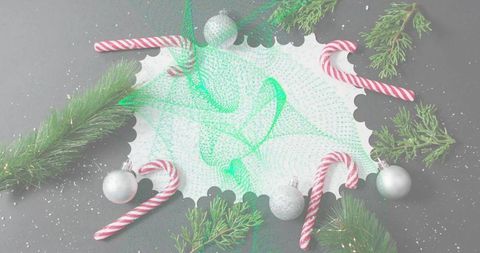 Scalloped Holiday Card Featuring Green Mesh, Candy Canes and Silver Baubles Flatlay