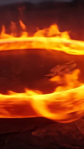 Pulsing Ring of Fire Vertical Video Combusting Circular Flame Orbiting Dark Pit Embers