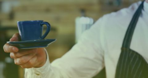 Barista Offering Coffee in Cafeteria - Download Free Stock Images Pikwizard.com