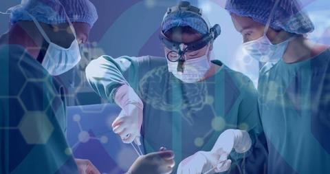 Diverse Surgical Team Operating in High-Tech Medical Environment - Download Free Stock Images Pikwizard.com