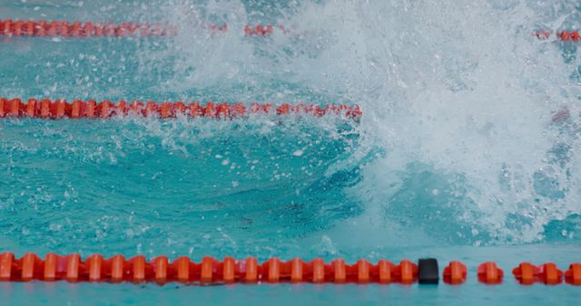 Swimmer Making Strong Splash in Competitive Swimming Pool - Download Free Stock Images Pikwizard.com