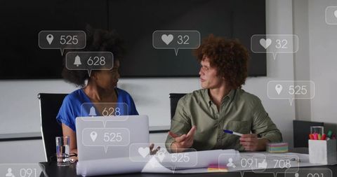 Discussing Project Plans in Office Meeting with Social Media Notifications Overlay